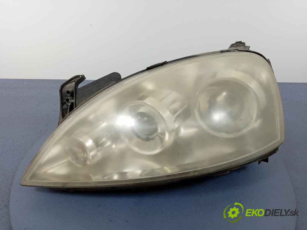 Opel Corsa 2001 Reflektor: Vľavo: 13100535