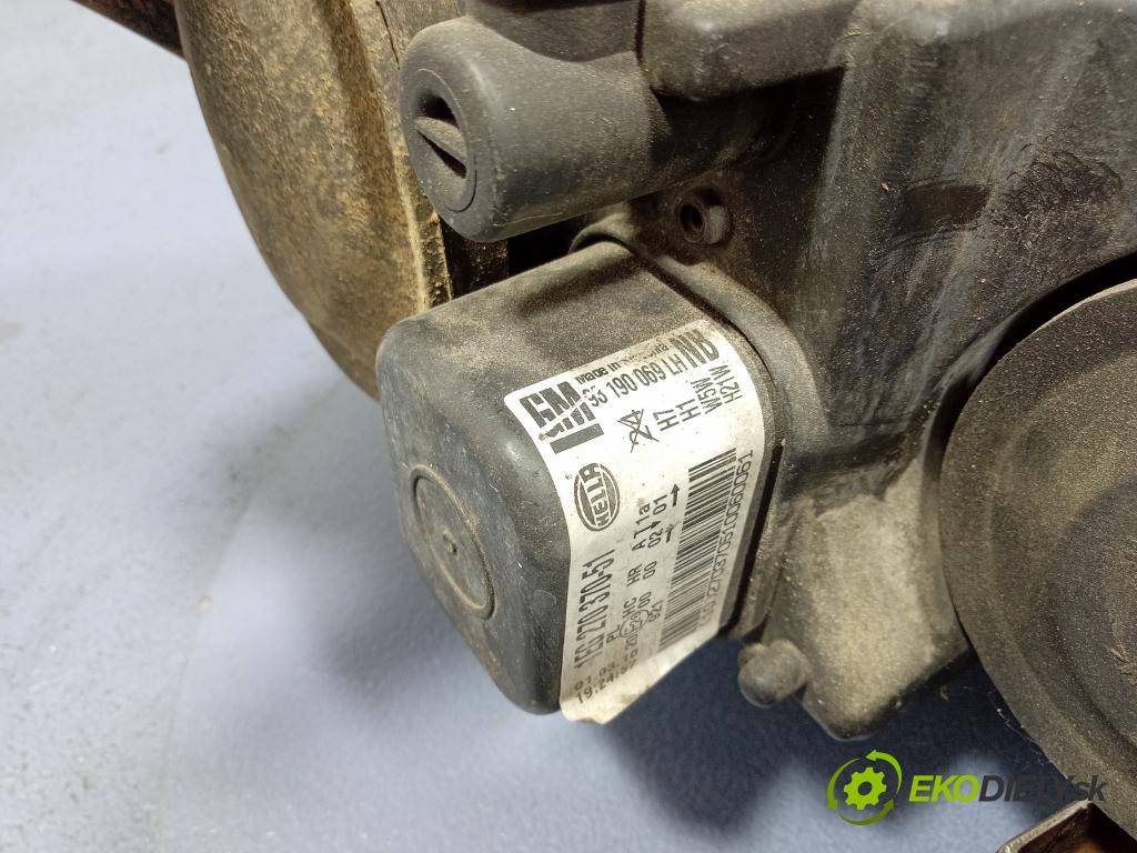 Opel Astra 2009 Reflektor: Vľavo: 93190069