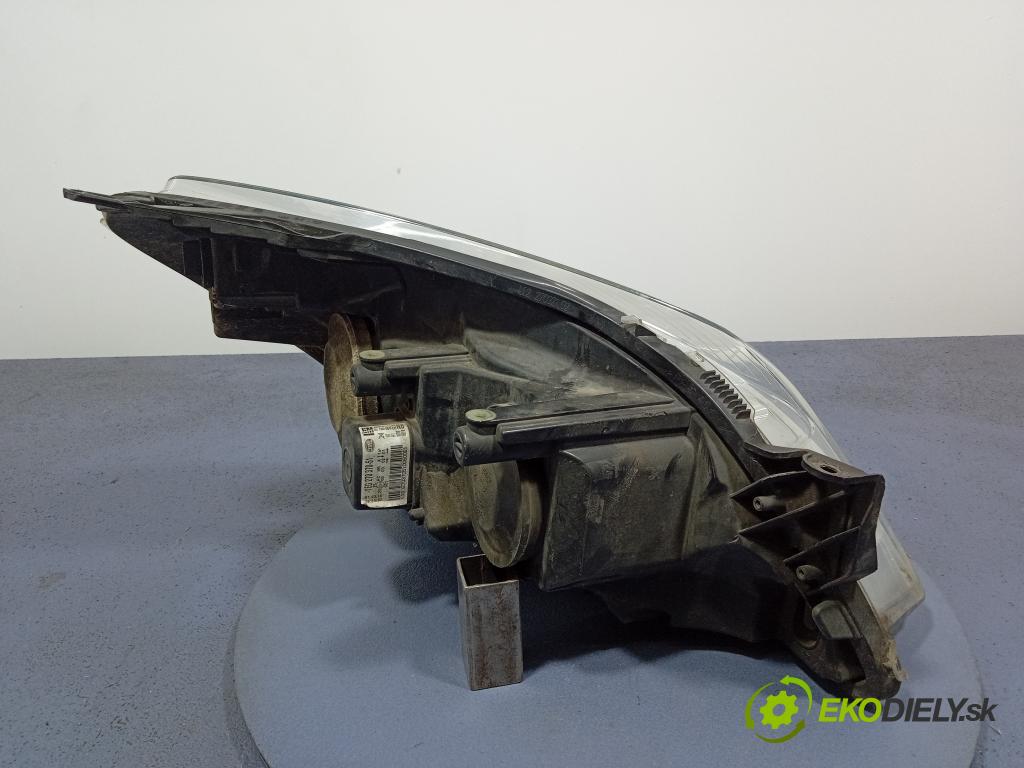 Opel Astra 2009 Reflektor: Vľavo: 93190069