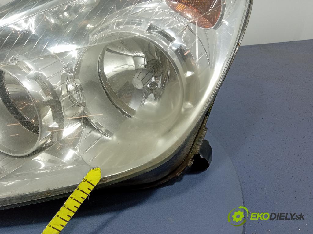 Opel Astra 2009 Reflektor: Vľavo: 93190069