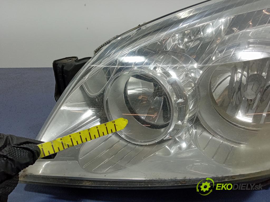 Opel Astra 2009 Reflektor: Vľavo: 93190069