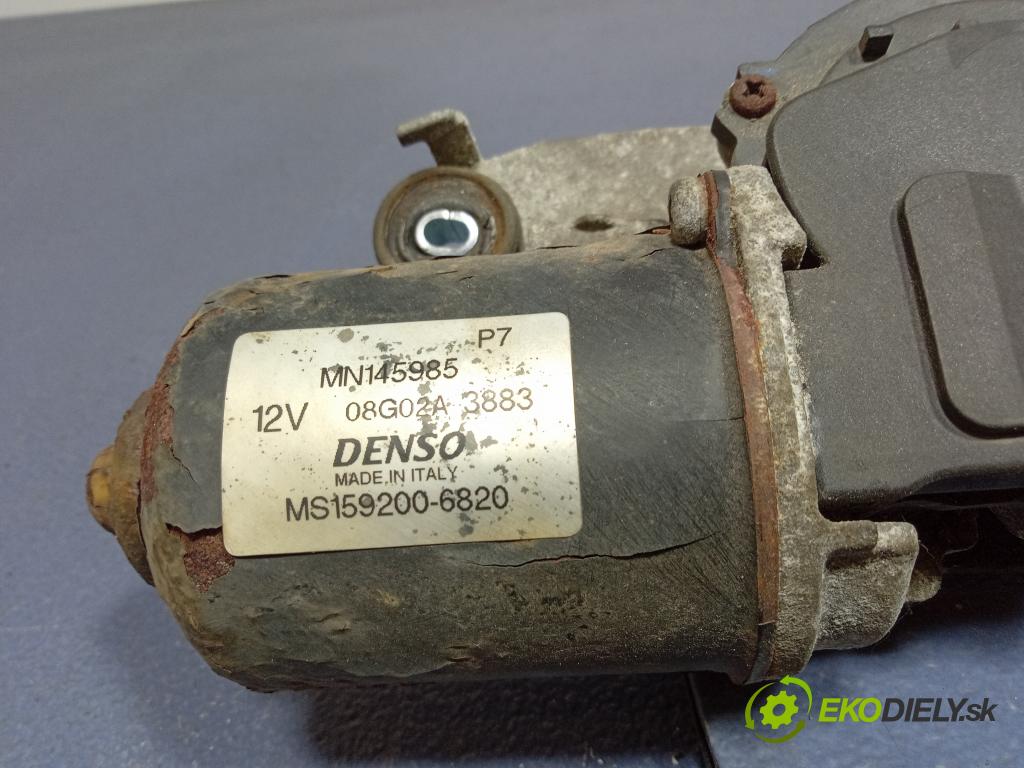 Mitsubishi Colt 2005 mechanismus motorek Stěrače: před MN145985