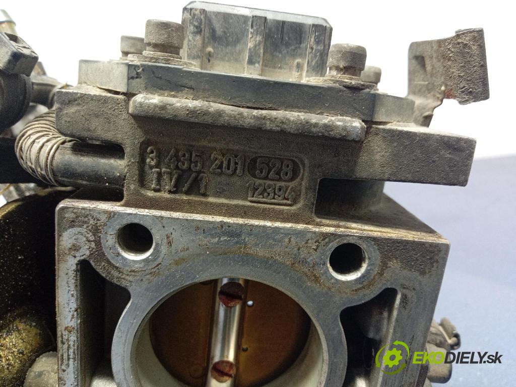 Volkswagen Passat 1.8 kat 1991 škrticí klapka 051133015S