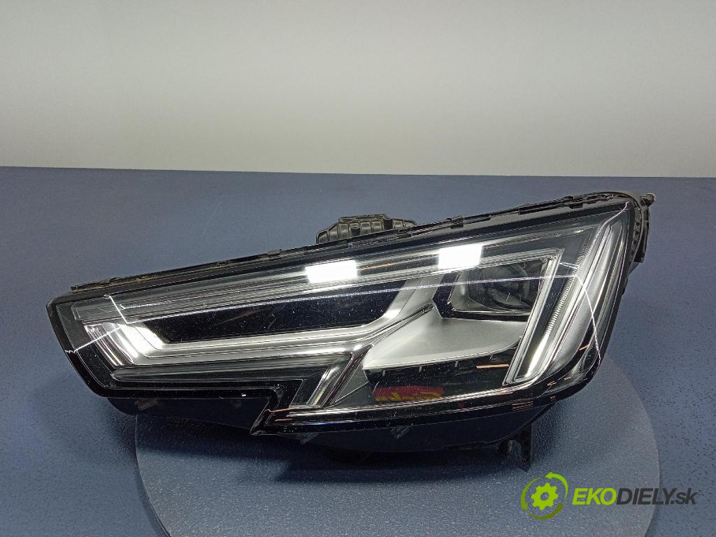 Audi A4 0 Reflektor: Vľavo: