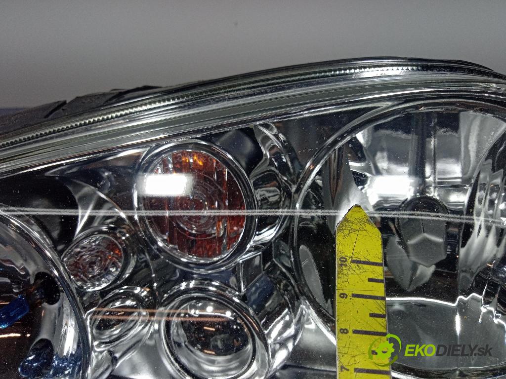Volkswagen Golf 2001 Reflektor: Vľavo: 20-5386