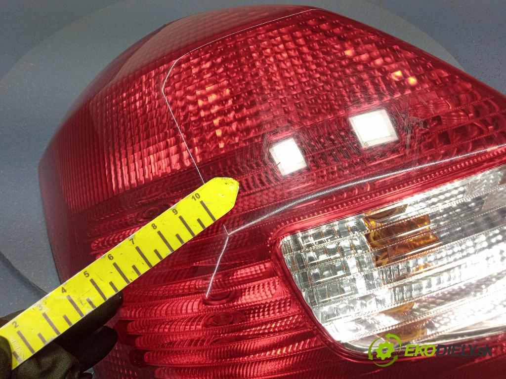Skoda Fabia 2010 svetlo / reflektor zad ľavá Vonkajsia: 5J6945095