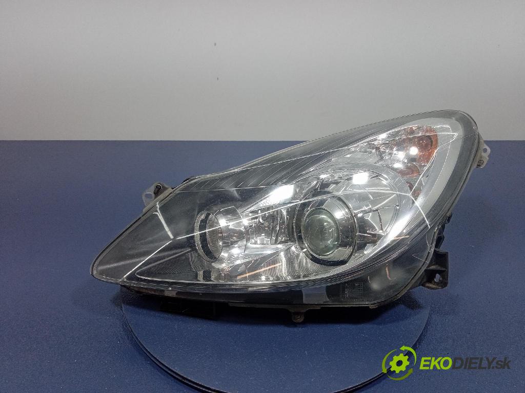 Opel Corsa 2010 Reflektor: Vľavo: 13186385