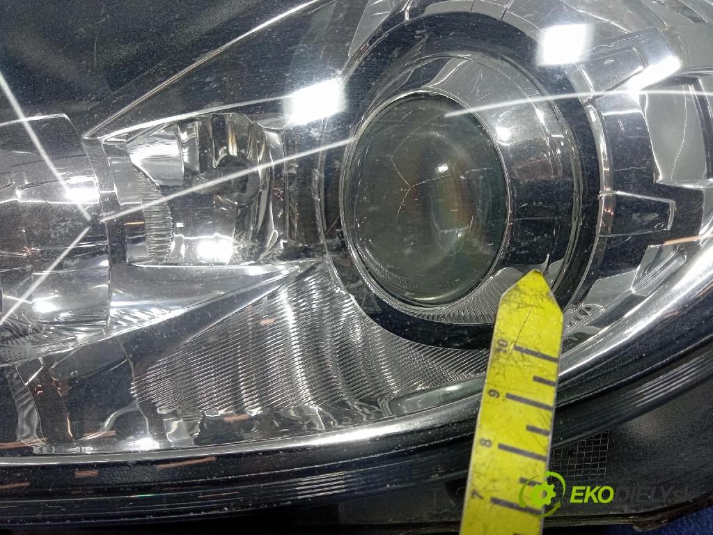 Opel Corsa 2010 Reflektor: Vľavo: 13186385