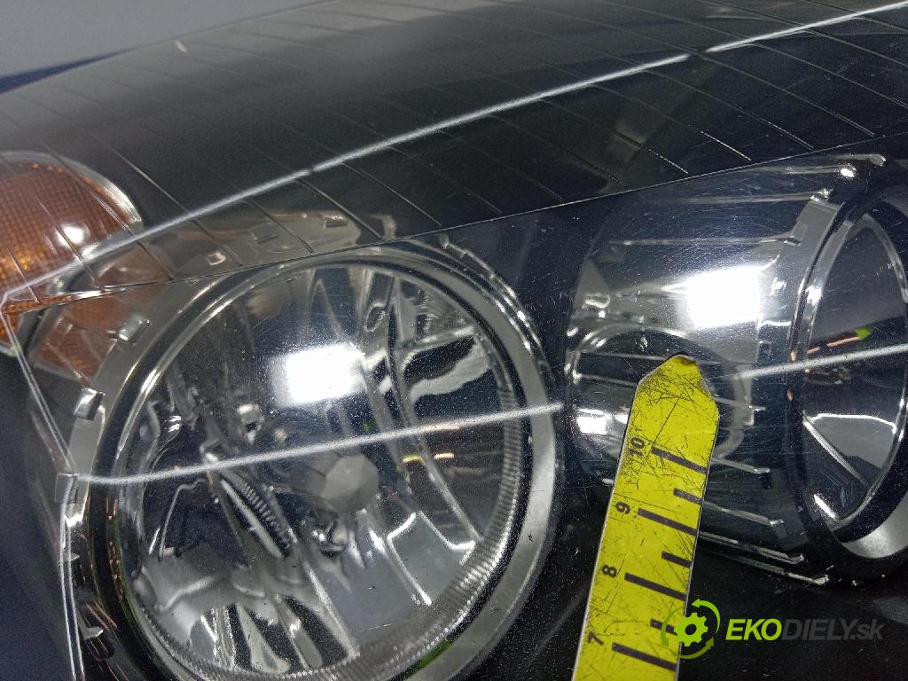 Opel Astra 2006 Reflektor: v pravo: 1EG270370