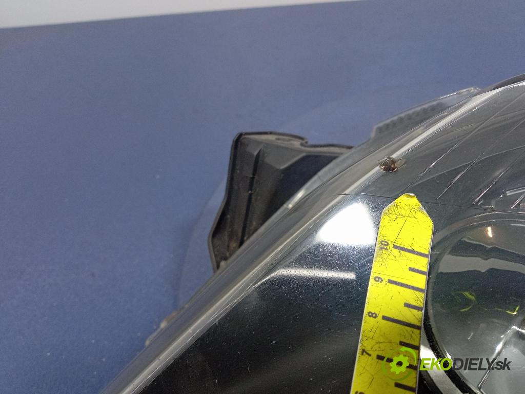 Opel Astra 2006 Reflektor: Vľavo: 1EG270370