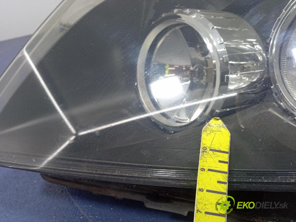 Opel Astra 2006 Reflektor: Vľavo: 1EG270370