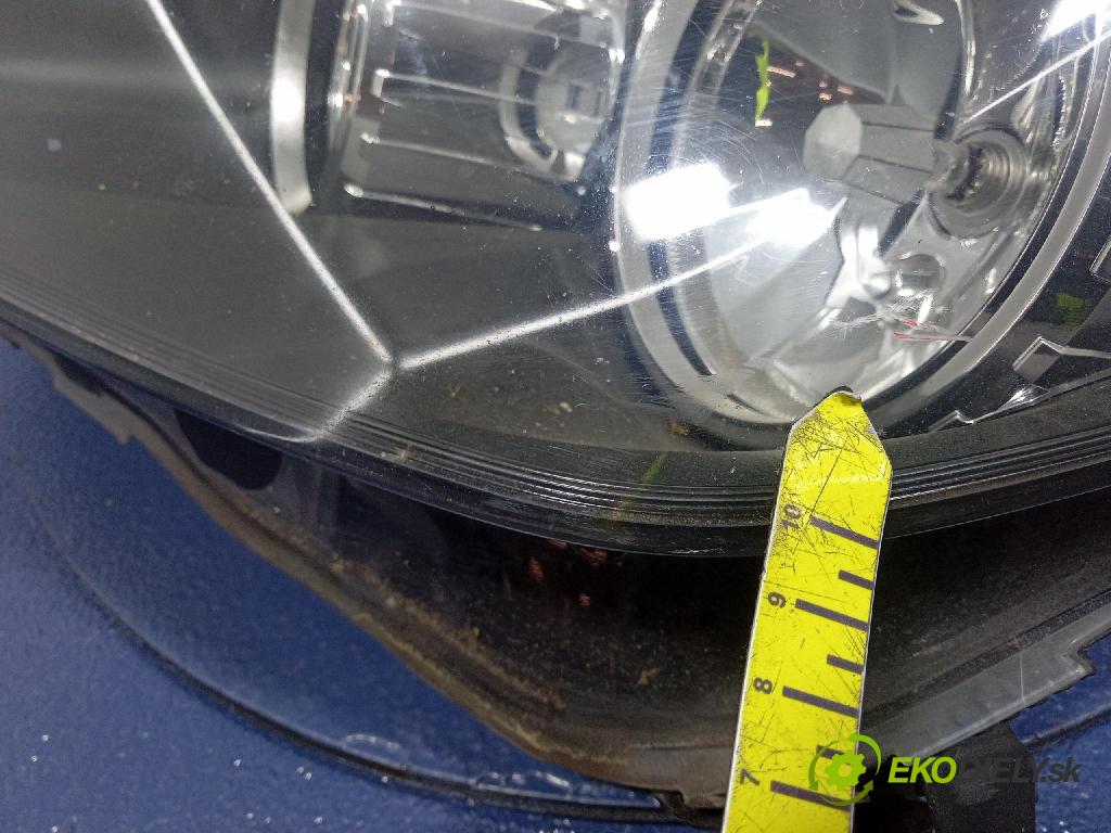 Opel Astra 2006 Reflektor: Vľavo: 1EG270370