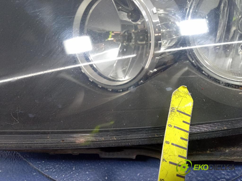 Opel Astra 2006 Reflektor: Vľavo: 1EG270370