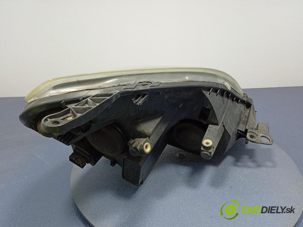 Opel Zafira 2006 Reflektor: Vľavo: 24451052