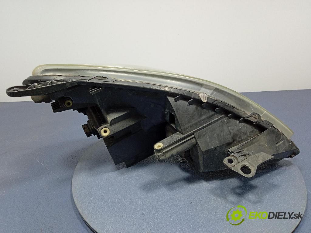 Opel Zafira 2006 Reflektor: Vľavo: 24451052