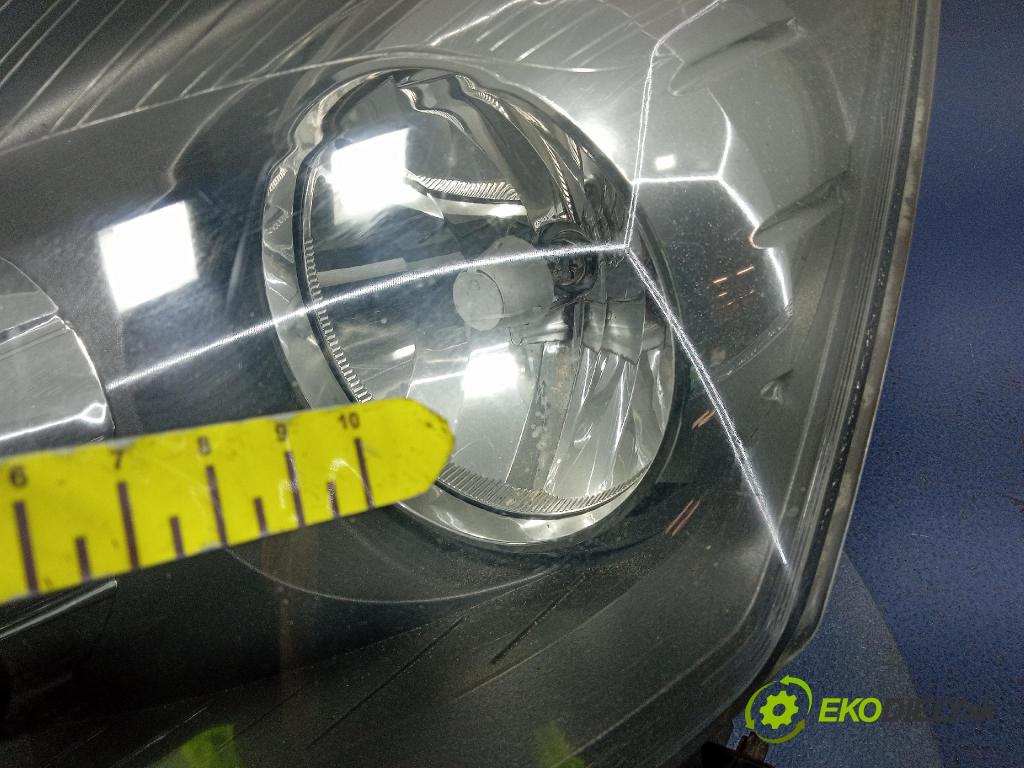 Opel Zafira 2006 Reflektor: Vľavo: 24451052