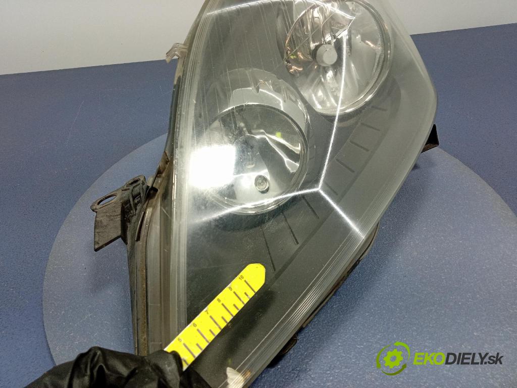 Opel Zafira 2006 Reflektor: Vľavo: 24451052