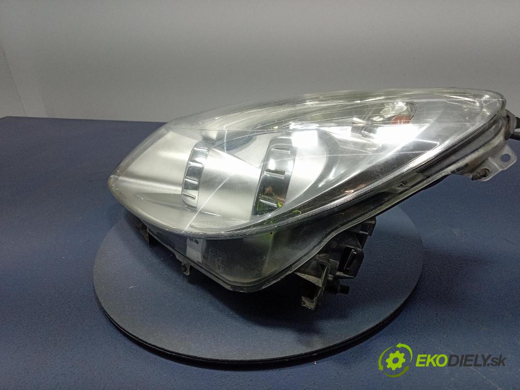 Opel Corsa 2007 Reflektor: Vľavo: 13186381