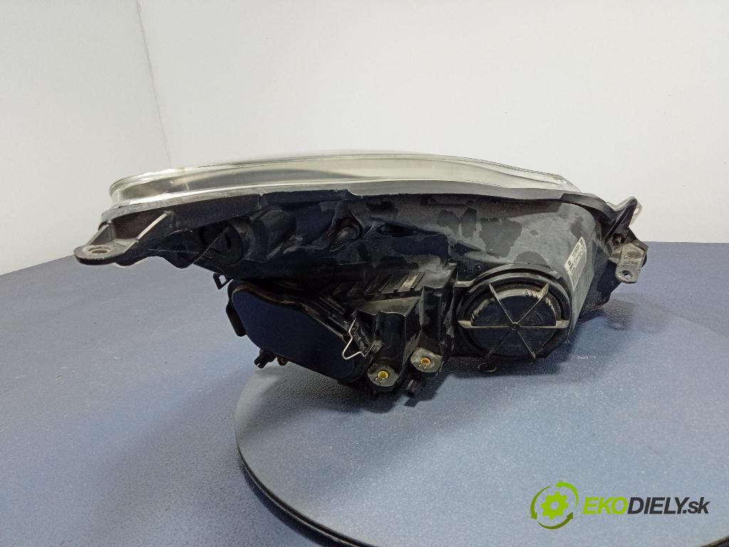 Opel Corsa 2007 Reflektor: Vľavo: 13186381