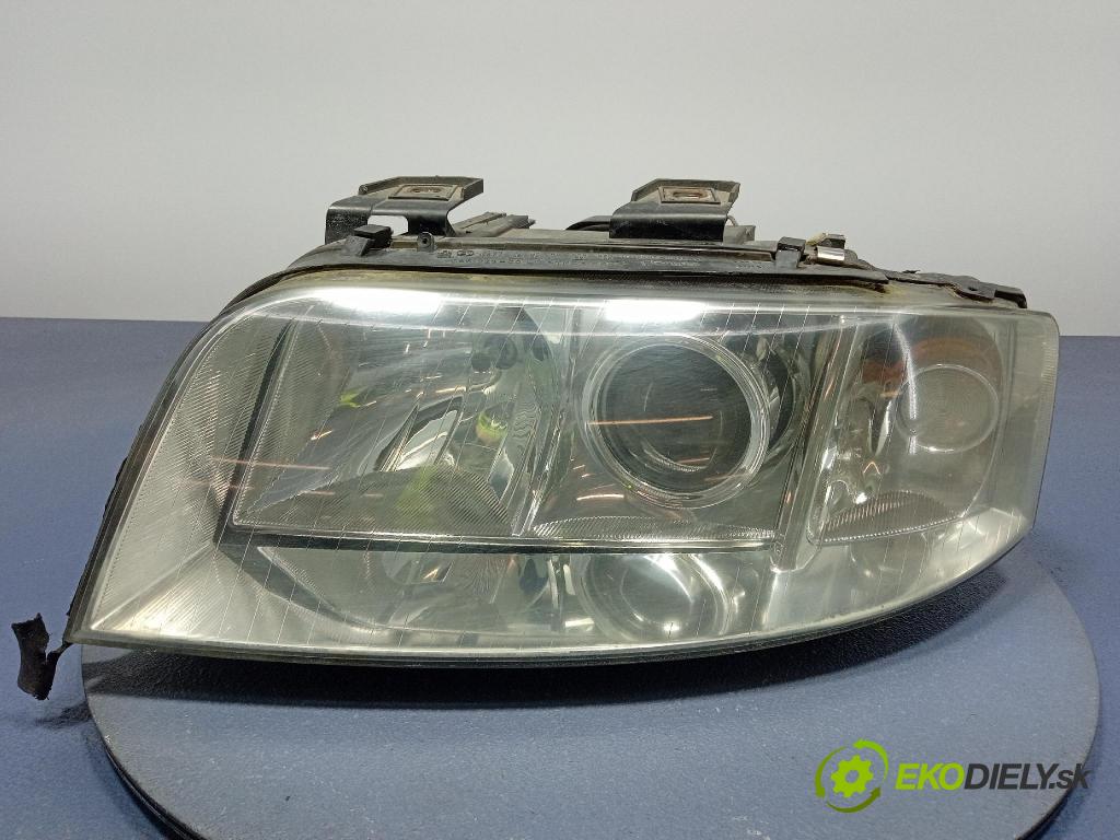 Audi A6 2002 Reflektor: Vľavo: 155929-00