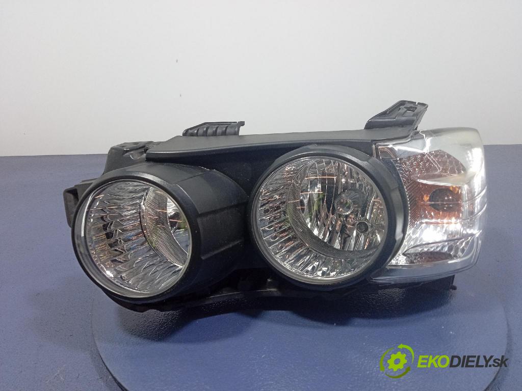 Chevrolet Aveo 2012 Reflektor: Vľavo: