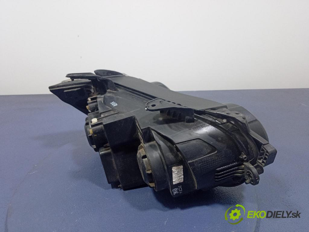 Chevrolet Aveo 2012 Reflektor: Vľavo: