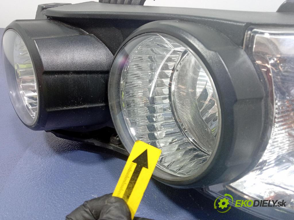 Chevrolet Aveo 2012 Reflektor: Vľavo: