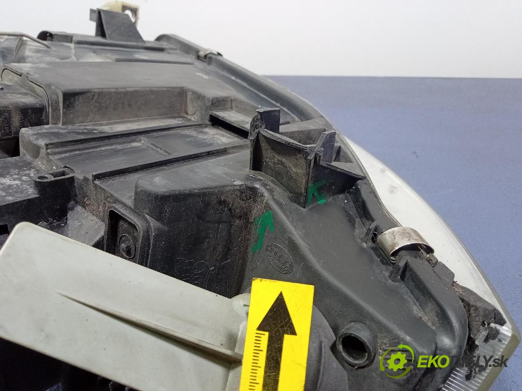 Audi A6 2003 Reflektor: Vľavo: 155929-00