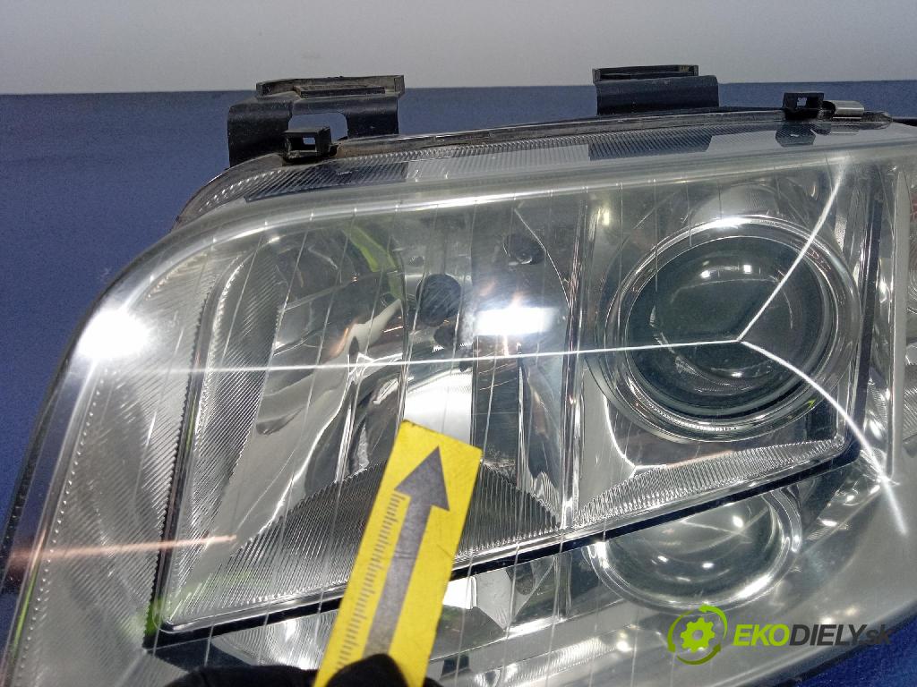 Audi A6 2003 Reflektor: Vľavo: 155929-00
