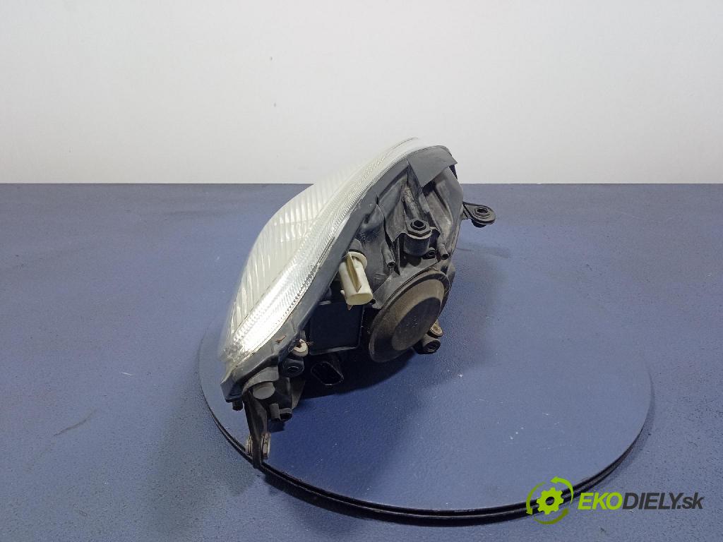 Skoda Fabia 2011 Reflektor: Vľavo: 20-E322