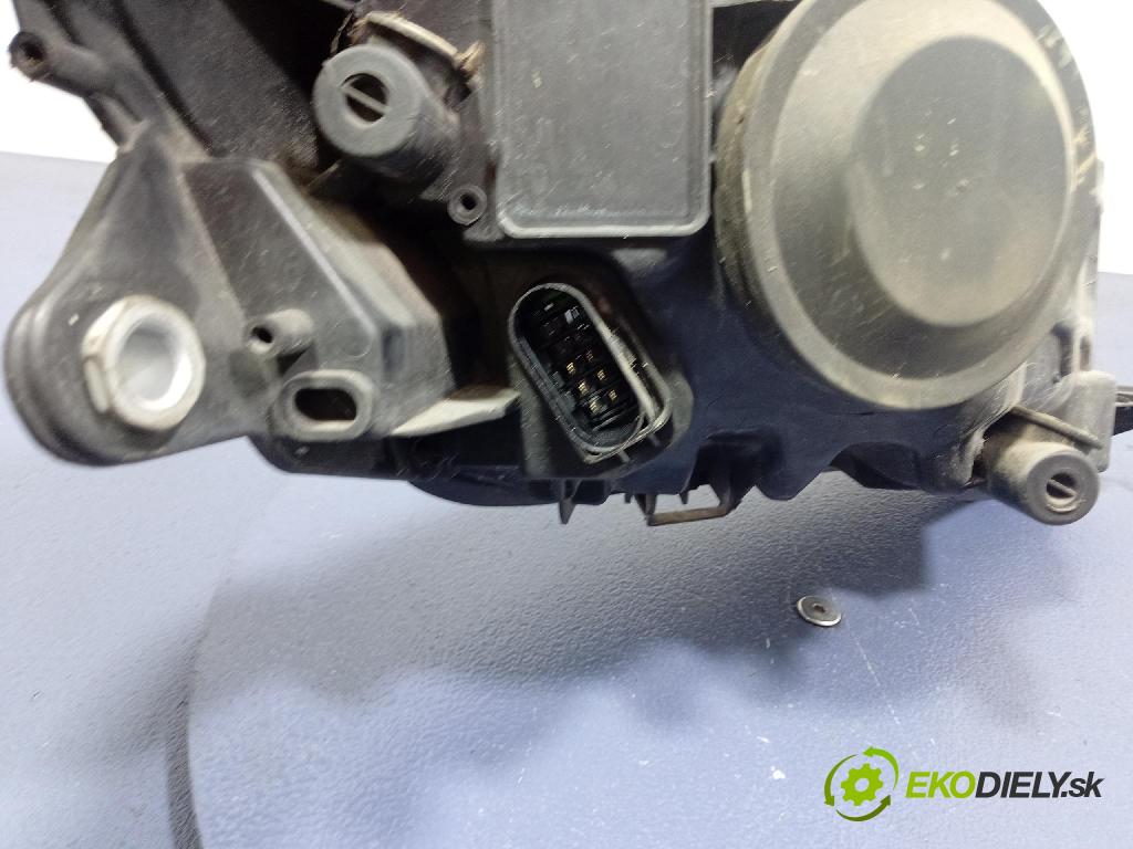 Skoda Fabia 2011 Reflektor: Vľavo: 20-E322