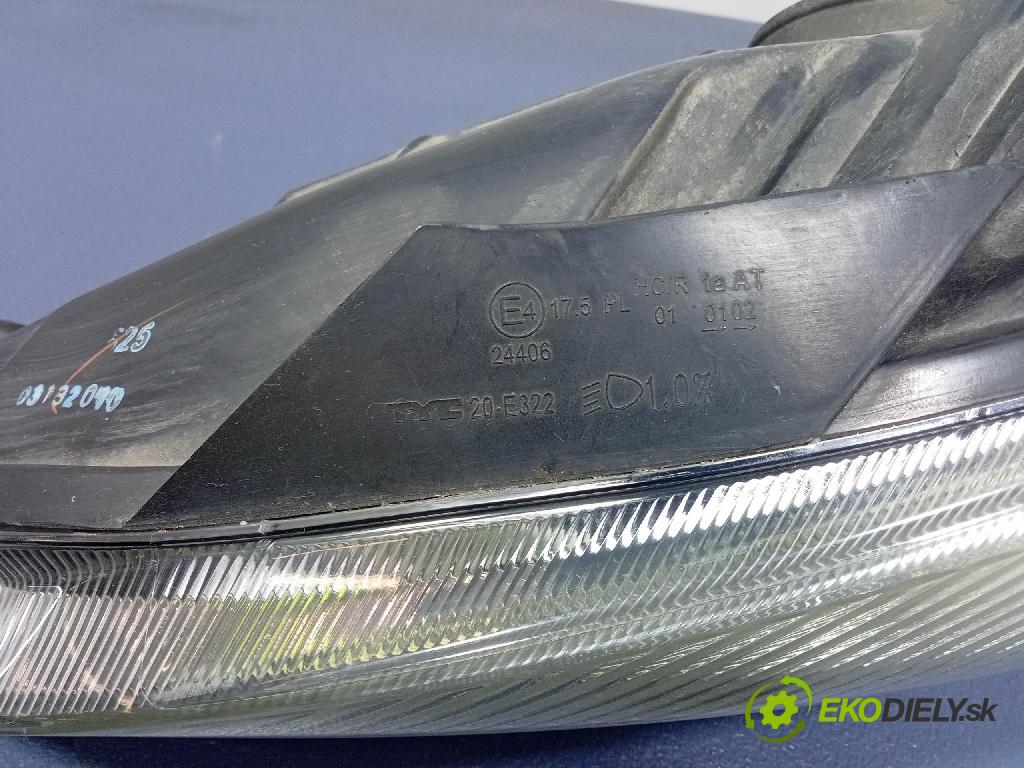 Skoda Fabia 2011 Reflektor: Vľavo: 20-E322