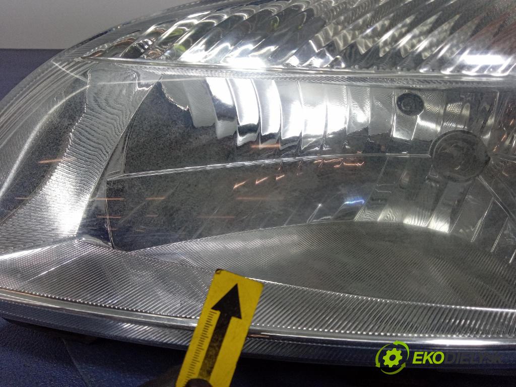 Skoda Fabia 2011 Reflektor: Vľavo: 20-E322