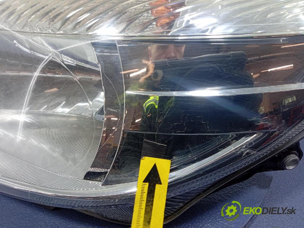 Skoda Fabia 2011 Reflektor: Vľavo: 20-E322