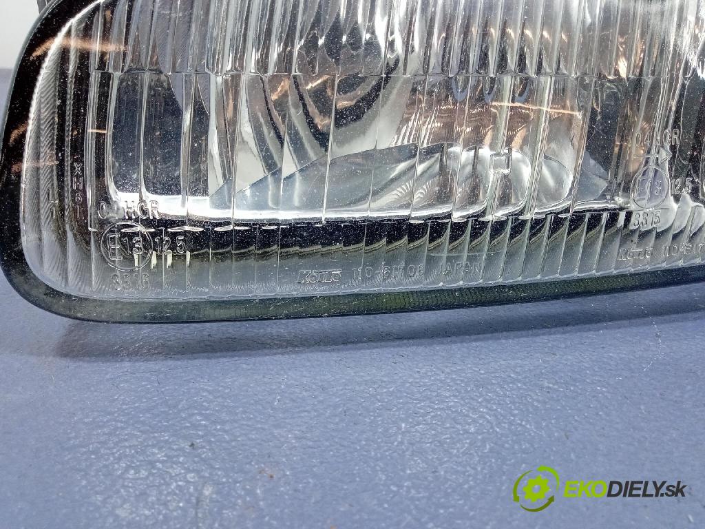 Mazda 323f 1997 Reflektor: Vľavo: 110-61708