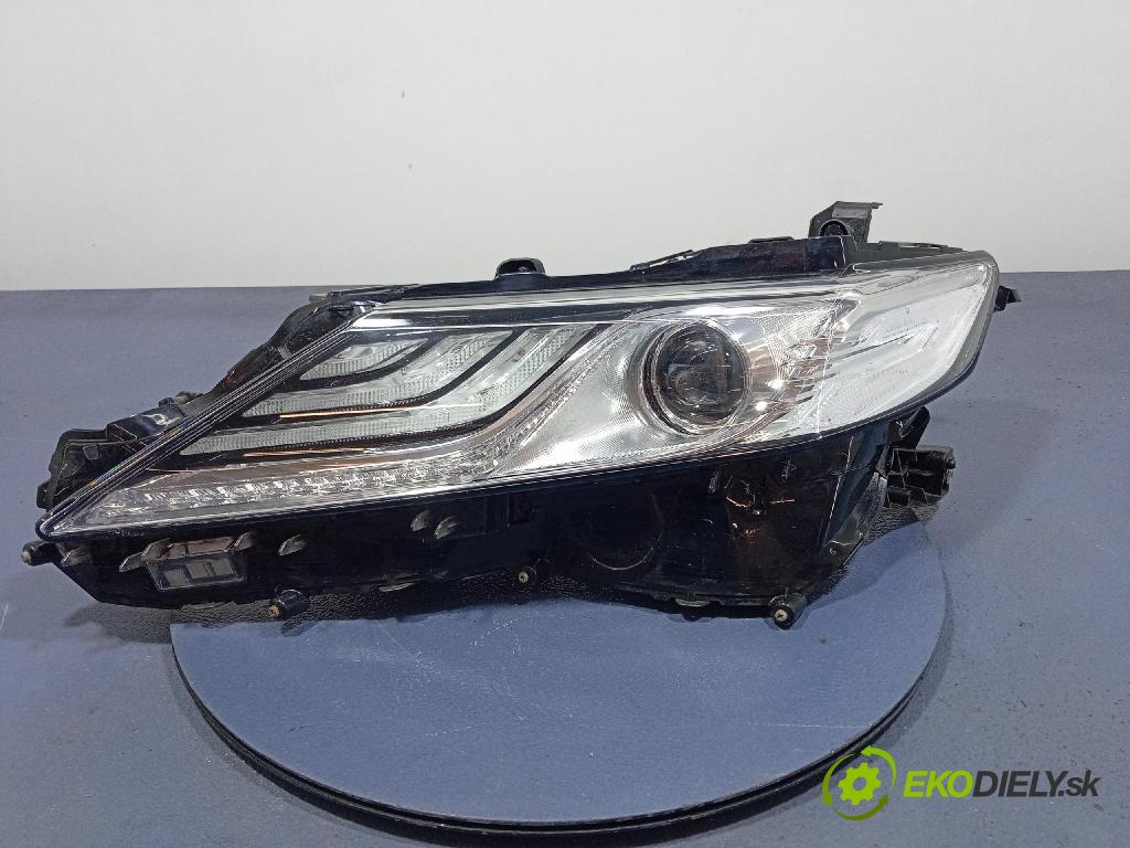 Toyota Camry 0 Reflektor: Vľavo: