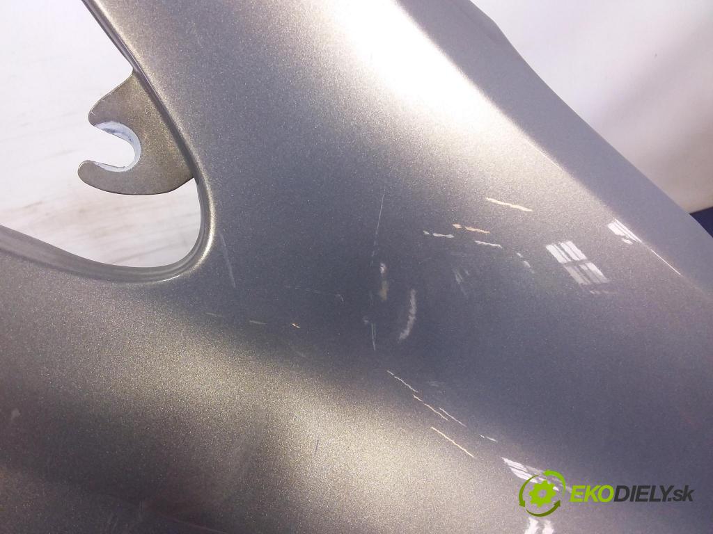Opel Corsa 2010 blatnik před v pravo: