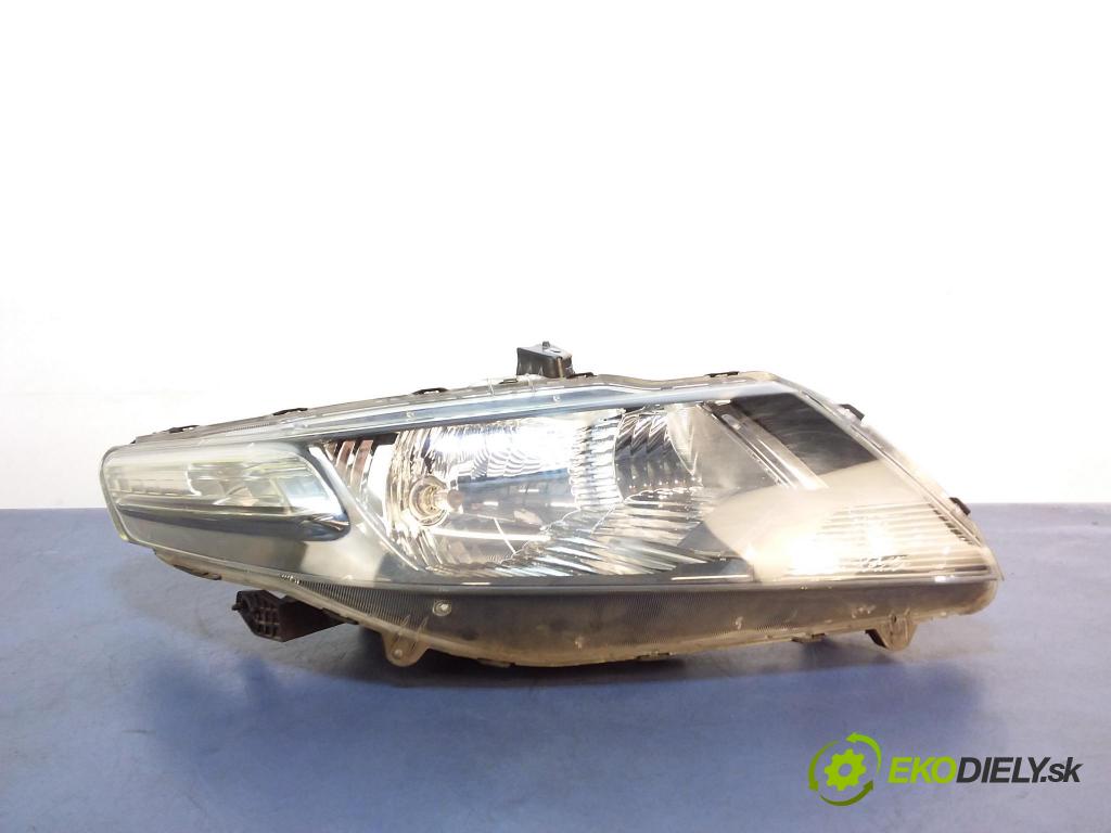 Honda City 2009 Reflektor: v pravo:
