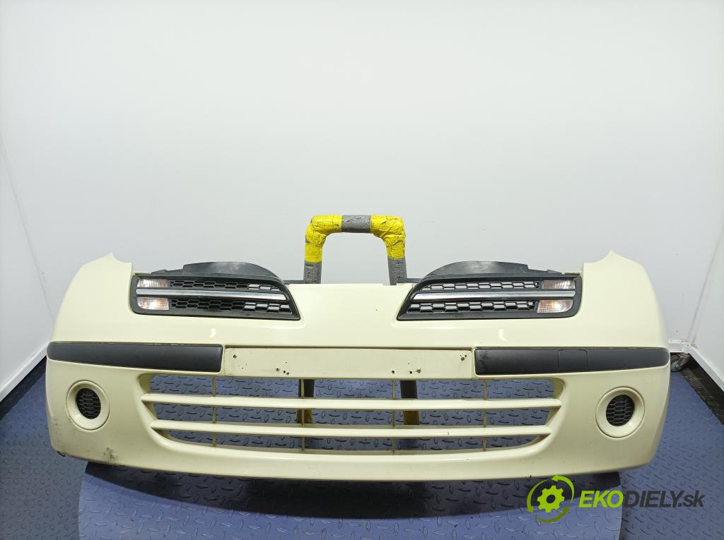 Nissan Micra 2005 nárazník před 01