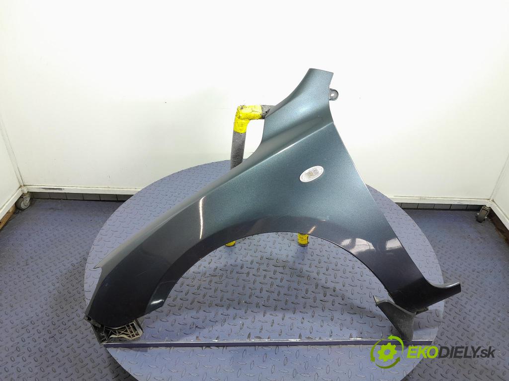 Mazda 3 2009 blatnik před Levý: