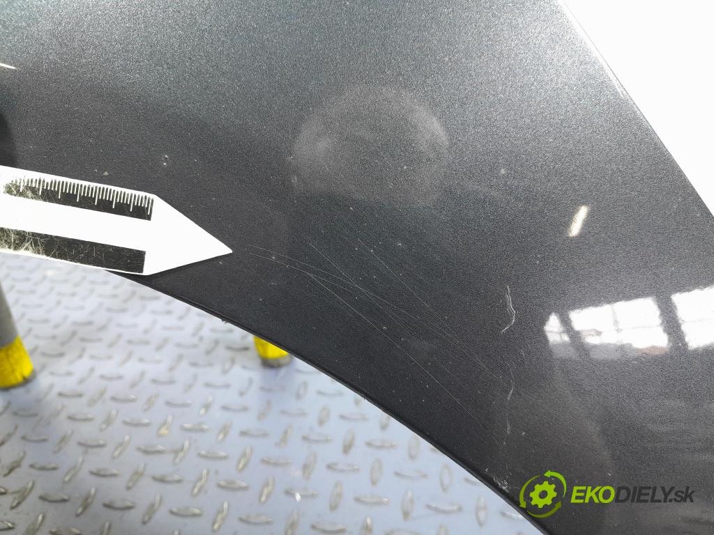 Mazda 3 2009 blatnik před Levý:
