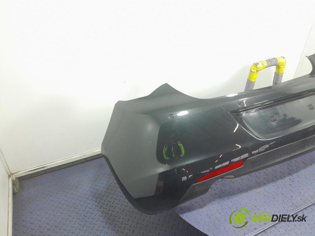 Opel Astra 2011 nárazník Zad: