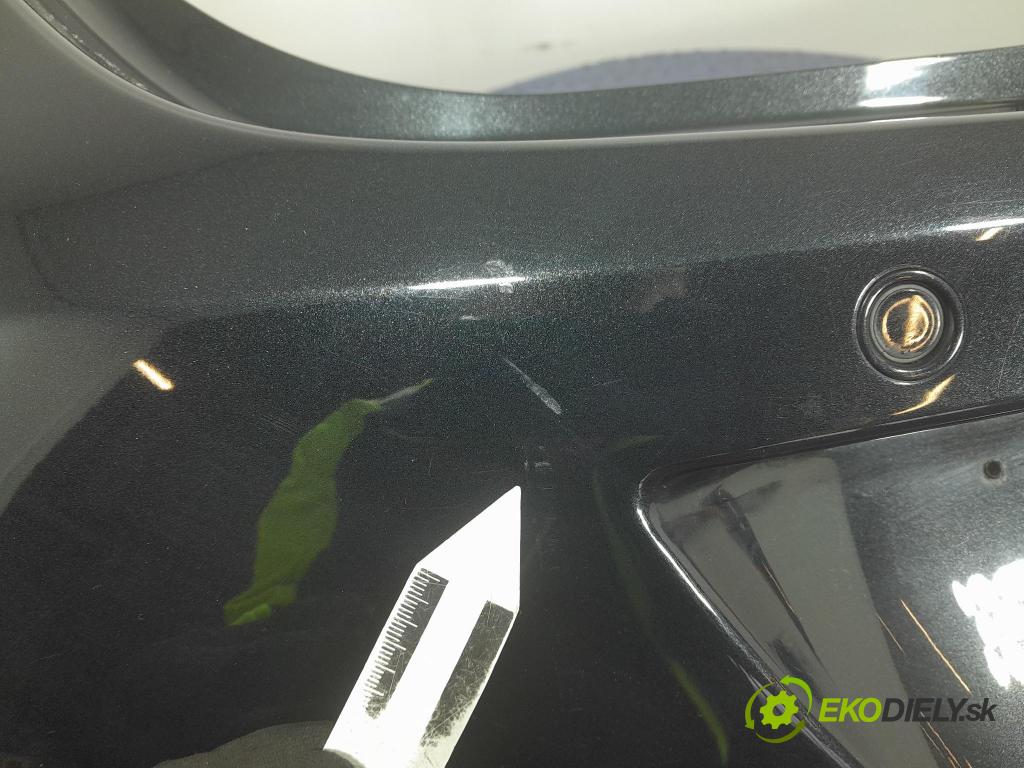 Opel Astra 2011 nárazník Zad:
