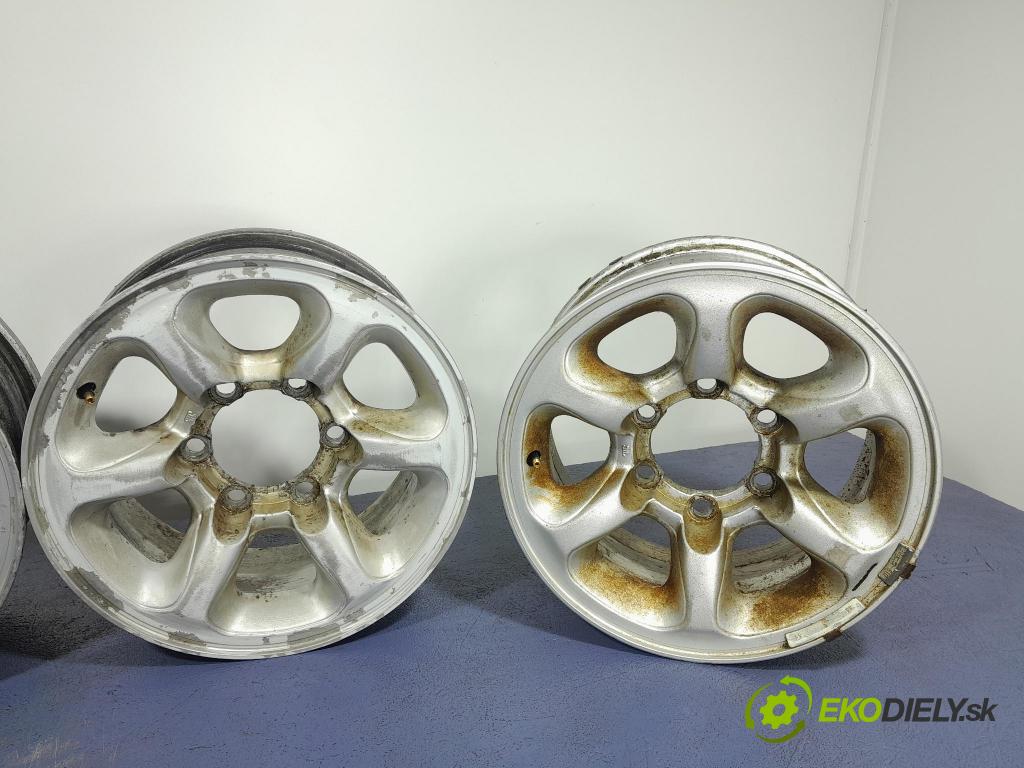 Mitsubishi Pajero 1999 Ráfiky: Hlinikové: