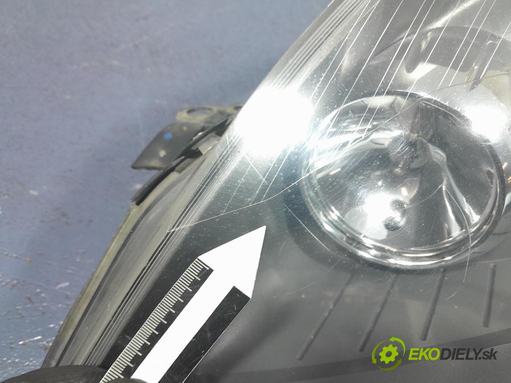 Opel Zafira 2006 Reflektor: Vľavo: 24451052