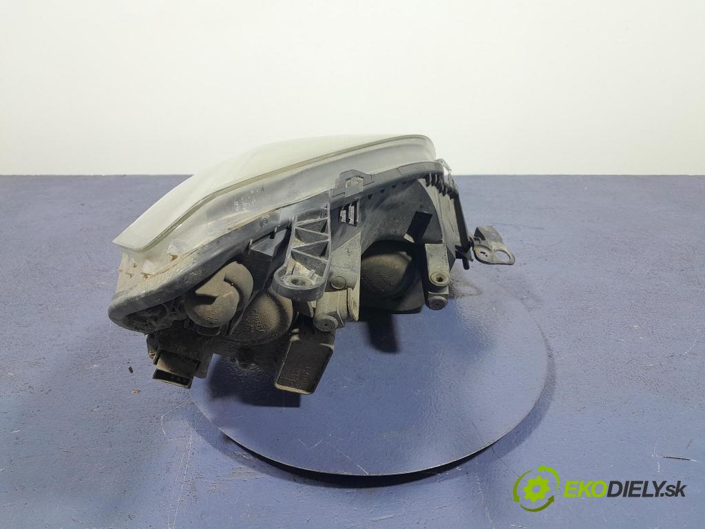 Opel Zafira 2006 Reflektor: Vľavo: 24451052