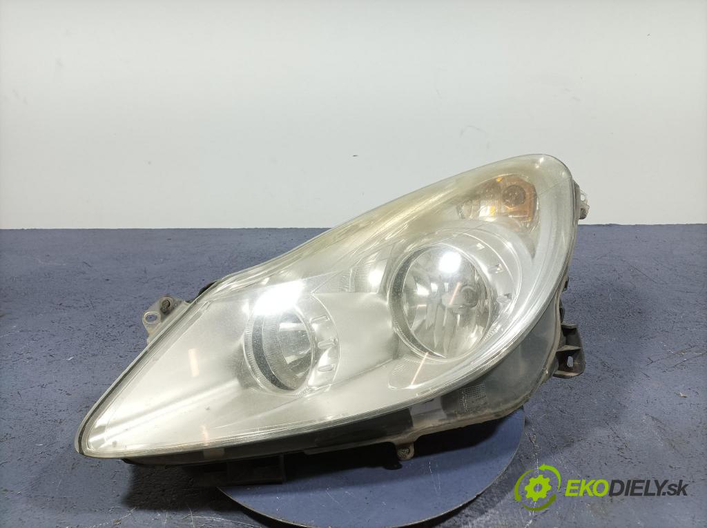 Opel Corsa 2009 Reflektor: Vľavo: 13186381