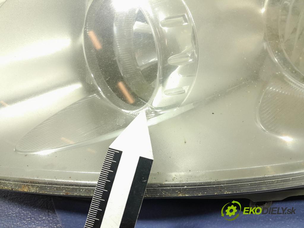 Opel Corsa 2008 Reflektor: Vľavo: 13186381