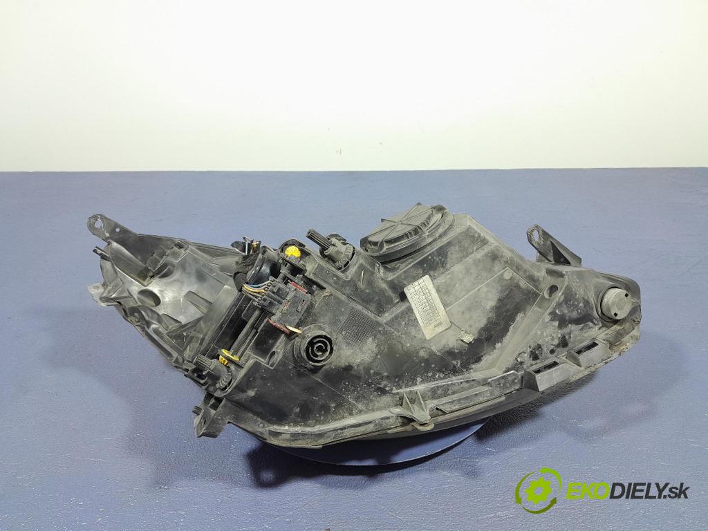 Opel Corsa 2008 Reflektor: Vľavo: 13186381