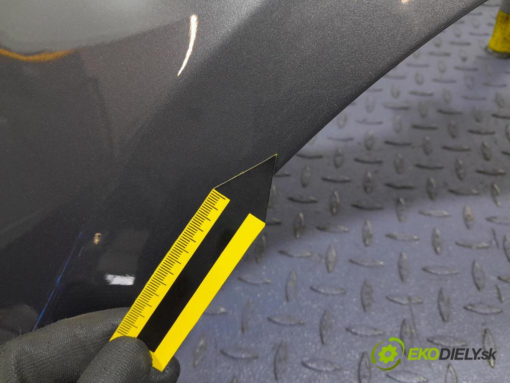 Opel Astra 2011 blatnik před Levý: